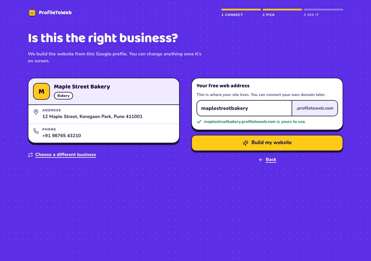 The Confirm screen: business details on the left, a free web address field and the Build my website button on the right